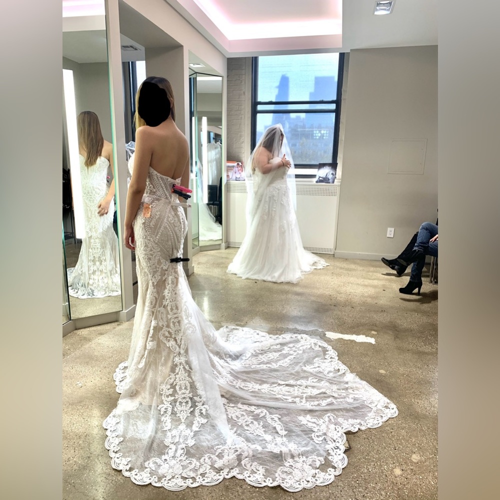 Fit and flare wedding dress, long train